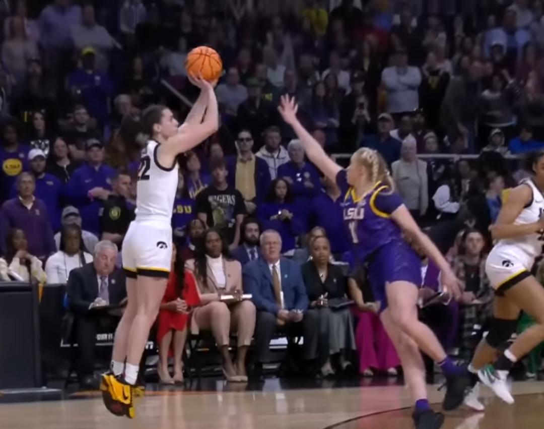 Picture: Caitlin Clark makes a basket in Iowa vs. LSU women's college basketball tournament game.