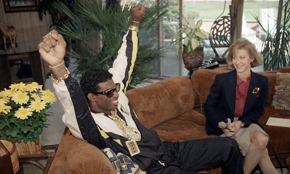 Picture: Deion Sanders celebrates being taken by Atlanta Falcons in 1989 NFL Draft