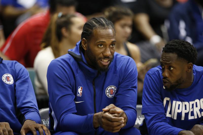 Picture: Kawhi Leonard sits on bench to manage his load