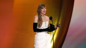 Picture: Taylor Swift accepting a Grammy