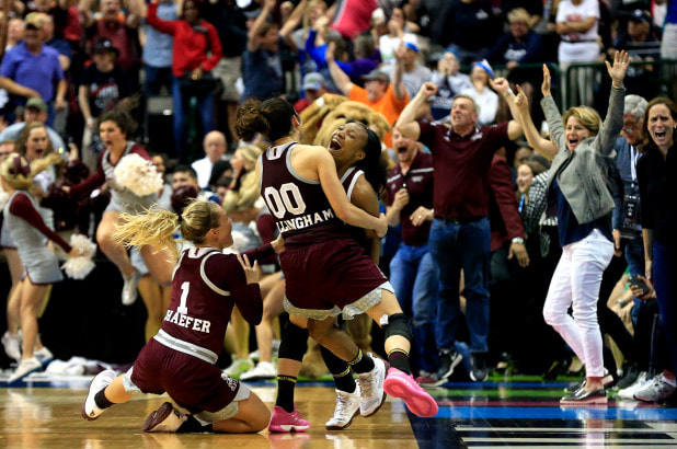 Picture: Mississippi State women's basketball players celebrate beating Connecticut 