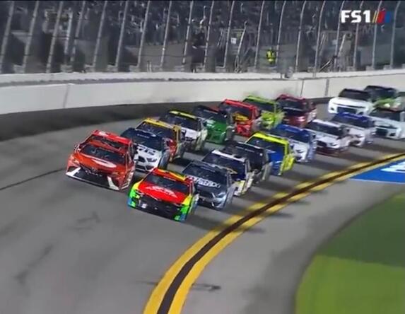 Picture: NASCAR car going around track at Daytona