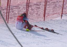 Picture: Mikaela Shiffrin seated on side of course after her slalom exit 