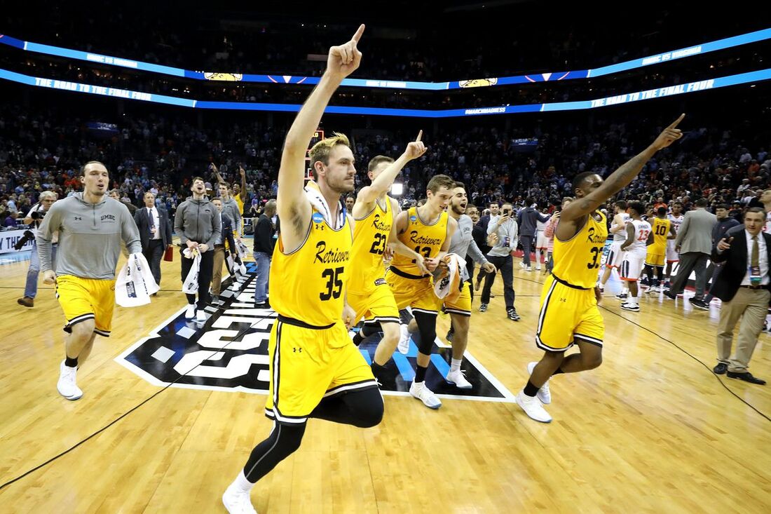 Picture: UMBC Retrievers celebrate being first 16 seed to win in March Madness